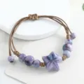 Handmade ceramic star bracelet, purple glazed beads with brown braided cord variant. - Small Starfish (Purple Royal Style)