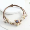 Handmade ceramic star bracelet with brown braided cord, cute minimalist design for daily wear. - Small Starfish (Rhino Texture Style)