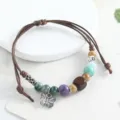 Handcrafted ceramic bead bracelet with a silver butterfly pendant, chic aesthetic style for daily wear. - Butterfly Square Wood Blocks