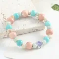 Nuovo bracciale di perle in ceramica stile cinese donna gioielli moda regalo - Linguaggio dei fiori (ghiaccio viola)