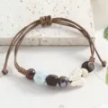 Retro literary woven beaded bracelet with cute ceramic butterfly and wooden beads for women. - Square Prism Butterfly (Light Blue)