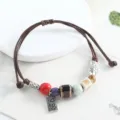 Chinese style handmade braided rope ceramic beads bracelet with cute fish charm and pendant. - Kiln-Glazed Red Column Beads