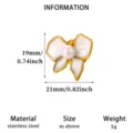Elegant stainless steel bow brooch with pearl inlay, 19x21mm compact size, lightweight 5g. - Pearl Bow Style (XZ446)