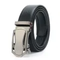 Close-up of the automatic metal buckle and textured black leather belt strap detail. - Style 1