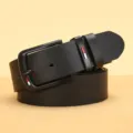 Men's black faux leather belt with metal pin buckle and stylish striped loop detail. - Black