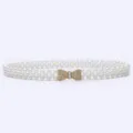 Pearl rhinestone belt detail showcasing dual-row pearls and sparkling bow clasp design. - 13