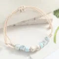 Ceramic beaded bracelet with cute bone charm and light blue ceramic beads for women variant. - Bone Square Silver Grey
