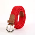 Red braided elastic belt featuring a silver metal buckle and PU leather ends. - Red