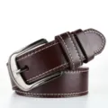 Detailed view of the brown PU leather belt featuring white contrast stitching and a pin buckle. - Coffee