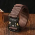 Brown tactical canvas belt detail, durable nylon webbing with quick-release metal buckle. - Coffee