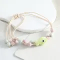 Süßes Keramik Fisch Armband mit Pastell Perlen und geflochtenem Seil, Ozean Stil Schmuck. - Polka-Dot-Fisch (Gelbgrün)