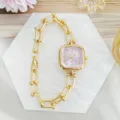 Luxury square women watch with purple dial and chain strap, elegant fashion timepiece detail. - Gold Purple