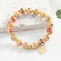 Bracelet en perles de ceramique de Jingdezhen avec glaeure coloree et pendentif Fu dore. - 8mm / Jaune Noir Rouge