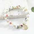 Bracelet de perles en céramique de Jingdezhen avec perles dorées et pendentif Fu, bijoux chinois. - 8mm / Blanc Mélangé