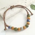 Retro Chinese style ceramic woven adjustable bracelet with multi-color beads for daily wear. - Glazed Gold