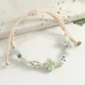 Light green ceramic clover braided bracelet, minimalist handmade beaded rope jewelry for women. - Electroplated Four-Leaf Clover Bean Green