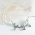 Joli bracelet de perles en céramique Jingdezhen avec pendentif papillon et cloches - Perle ronde papillon (céladon)