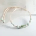 Bracelet en perles de céramique style chinois avec pendentif bambou, cordon réglable. - Double nœud de bambou (Céladon)