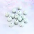 Light green ceramic loose beads for DIY bracelets and jewelry making, smooth glazed round charm. - 6mm Bead / Bean Green