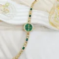 Luxus Damen Armbanduhr in Gold mit gruenem Zifferblatt glitzernde Strasssteine Schmuckdesign - Grün