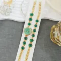 Gold-tone women's quartz watch and green stone bracelet set, elegant fashion accessory. - Green