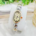 Elegante ovale Damenuhr mit Quarzwerk, goldenem Zifferblatt und stilvollem Kugelarmband für Damen. - Gold & Silber