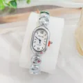 Elegante Quarzuhr mit ovalem Zifferblatt und einzigartigem silbernem Perlenarmband Detail. - Silber Weiß