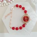 Elegant red beaded quartz watch bracelet for women with rhinestone dial and rose gold finish. - Red