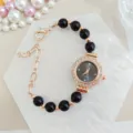 Women's quartz watch with black beaded bracelet, rose gold chain and rhinestone dial. - Black