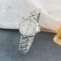 Close-up detail of the elegant women quartz watch featuring a roman numeral dial and strap. - Two-Tone White