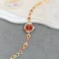Orologio da polso da donna vintage con strass rossi ed elegante design catena oro. - Rosso