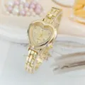 Orologio da donna al quarzo dorato a forma di cuore con quadrante strass e cinturino a catena. - Oro