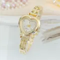 Elegante orologio da donna al quarzo dorato a forma di cuore con cinturino a catena. - Oro Bianco