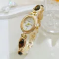 Elegante orologio da donna al quarzo stile vintage con pietra occhio di tigre e bracciale. - Tonalità Oro con Occhio di Tigre Marrone