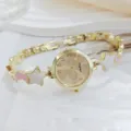 Elegant star and moon dial detail of the luxury women gold bracelet watch piece. - Gold Dial Pink