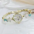 Elegant women's watch with star and moon bracelet strap, gold finish, luxury chic style. - White Dial Light Blue