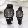 Square steel strap couple quartz watch set with minimalist black dial and calendar view. - Black