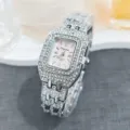 Detailed close up view of luxury square rhinestone women quartz watch with pink dial and strap. - Silver Pink