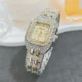 Detailed close-up of the luxury diamond-encrusted square quartz women watch, sparkling rhinestones. - Two-tone Gold