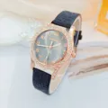 Modische Damen Quarz Armbanduhr mit Strass Lünette und schwarzem Lederarmband elegant - Schwarz