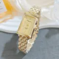 Elegante rechteckige Damen Quarzarmbanduhr mit goldenem Pyramiden Armband. - Goldene Skala