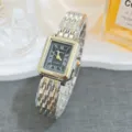 Elegant vintage rectangular quartz watch for women with black Roman numerals and two-tone metal strap. - Two-tone Gold Black