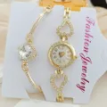 Luxus Strass Damen Uhr und Armband Set, goldene Quarzuhr mit Herz Design für Frauen. - Rundes Zifferblatt Herz Stil (Artikel 2025208)