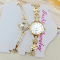 Elegantes Damen Gold Quarzuhr und Kristall Armband Set mit funkelnden Strass Blättern. - Blattförmiger Gliederstil (Artikel 2025208)