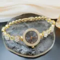 Exquisite rhinestone flower women quartz watch, elegant gold bracelet wristwatch detail view. - Watch Only Style / Gold Black