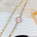 Luxury rhinestone floral women quartz watch and bracelet set detail view, elegant gold finish. - Watch and Bracelet Set / Gold Pink