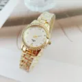 Fashion luxury gold rhinestone quartz women watch with steel strap and elegant digital dial details. - Gold White
