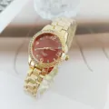 Luxury gold steel strap women quartz watch with sparkling rhinestone bezel and elegant red dial. - Gold Red