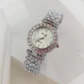Luxury rhinestone women quartz watch with sparkling crystals and arabic numeral dial. - Silver White