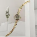 Elegante Damen Quarzwatch mit Strass Weizenblatt Armband und floralem Zifferblatt Design. - Gold Schwarz